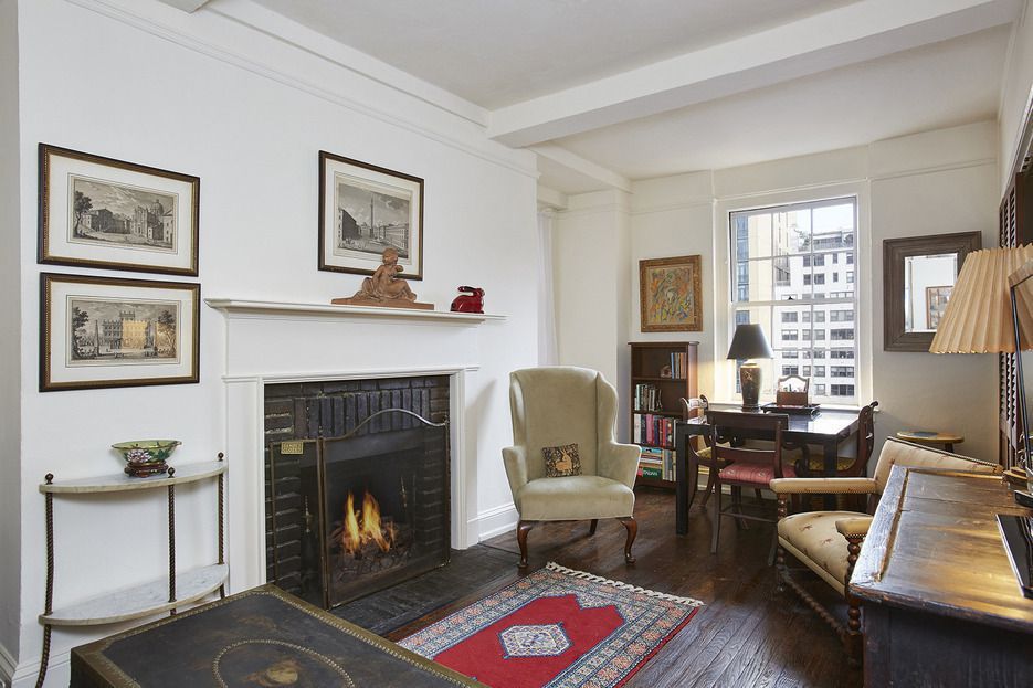 Curl up by the fire in this cozy East Side one-bedroom for only $495K