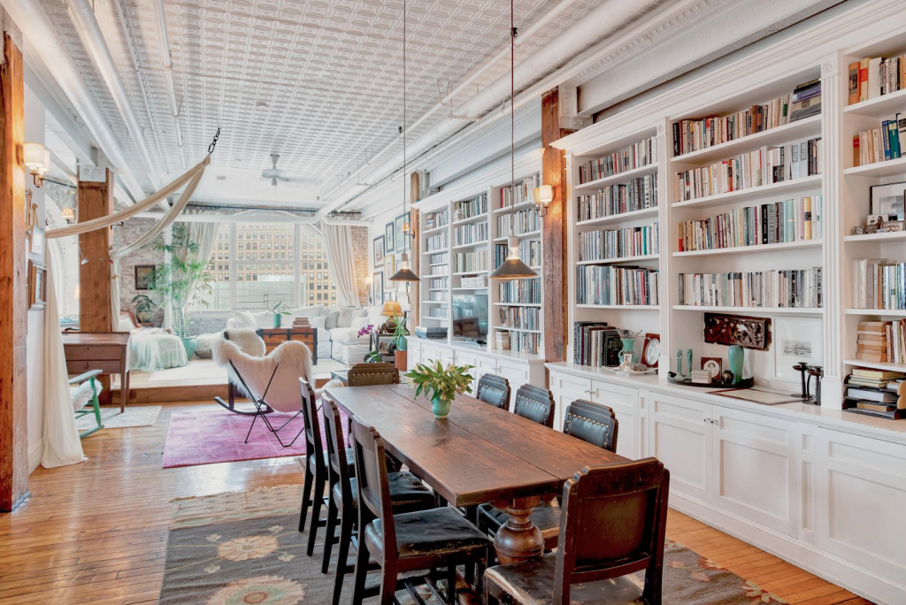 $2.4M Tribeca loft has a cool corner layout, arched windows, and amazing views