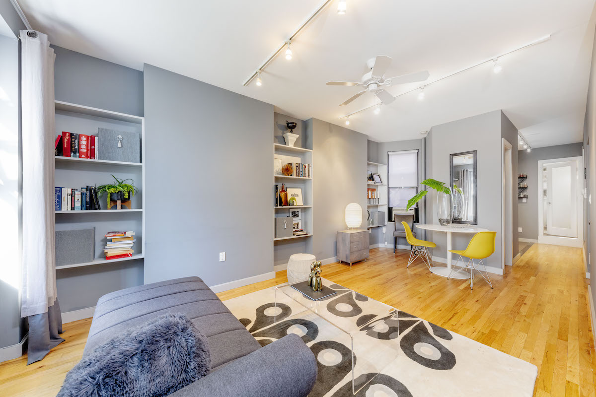 On-trend hues, a stylish renovation, and handy storage define this $429K Hell’s Kitchen studio
