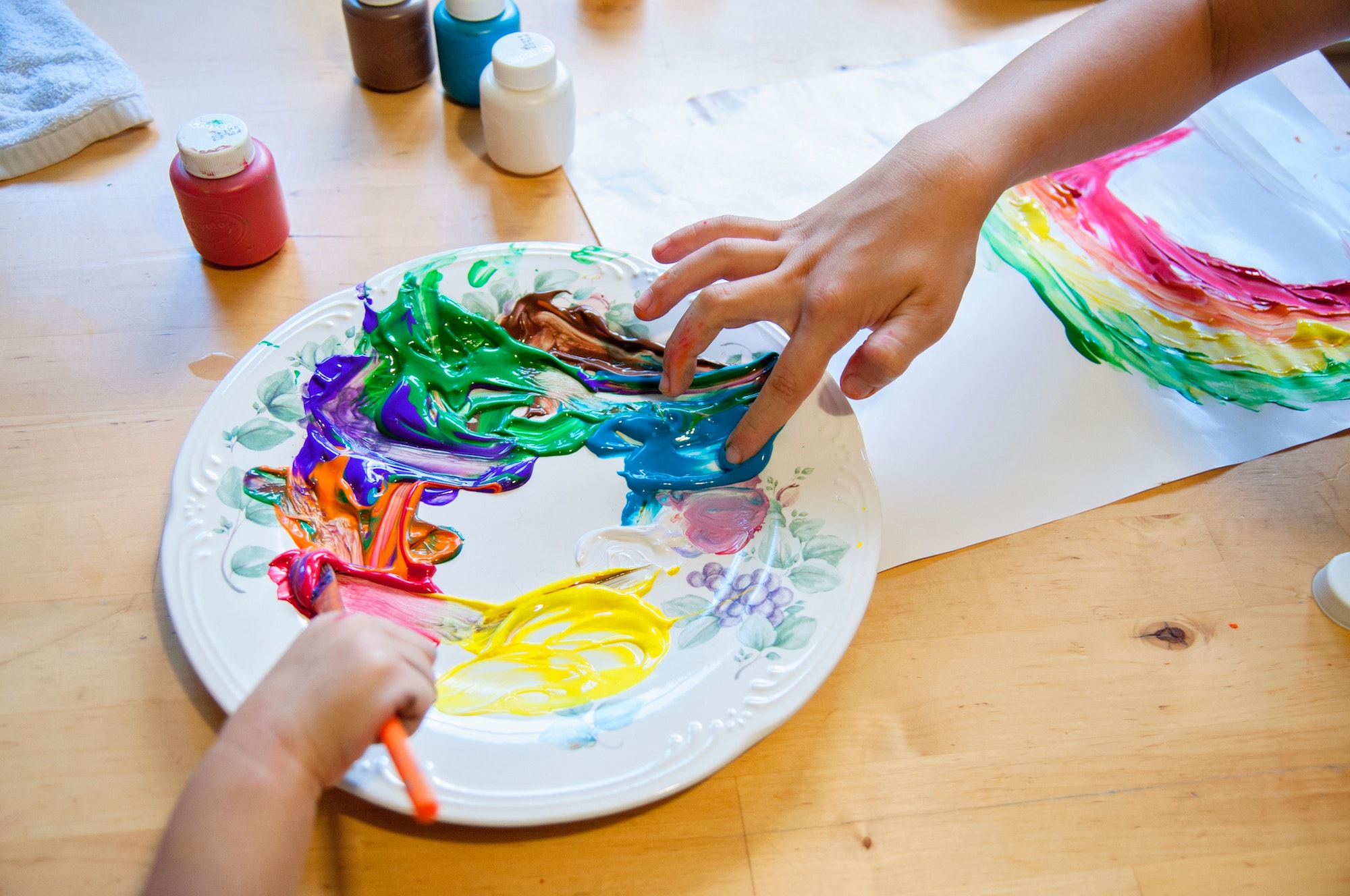 Brooklyn kids are hanging rainbow art in windows as part of a quarantine-style scavenger hunt