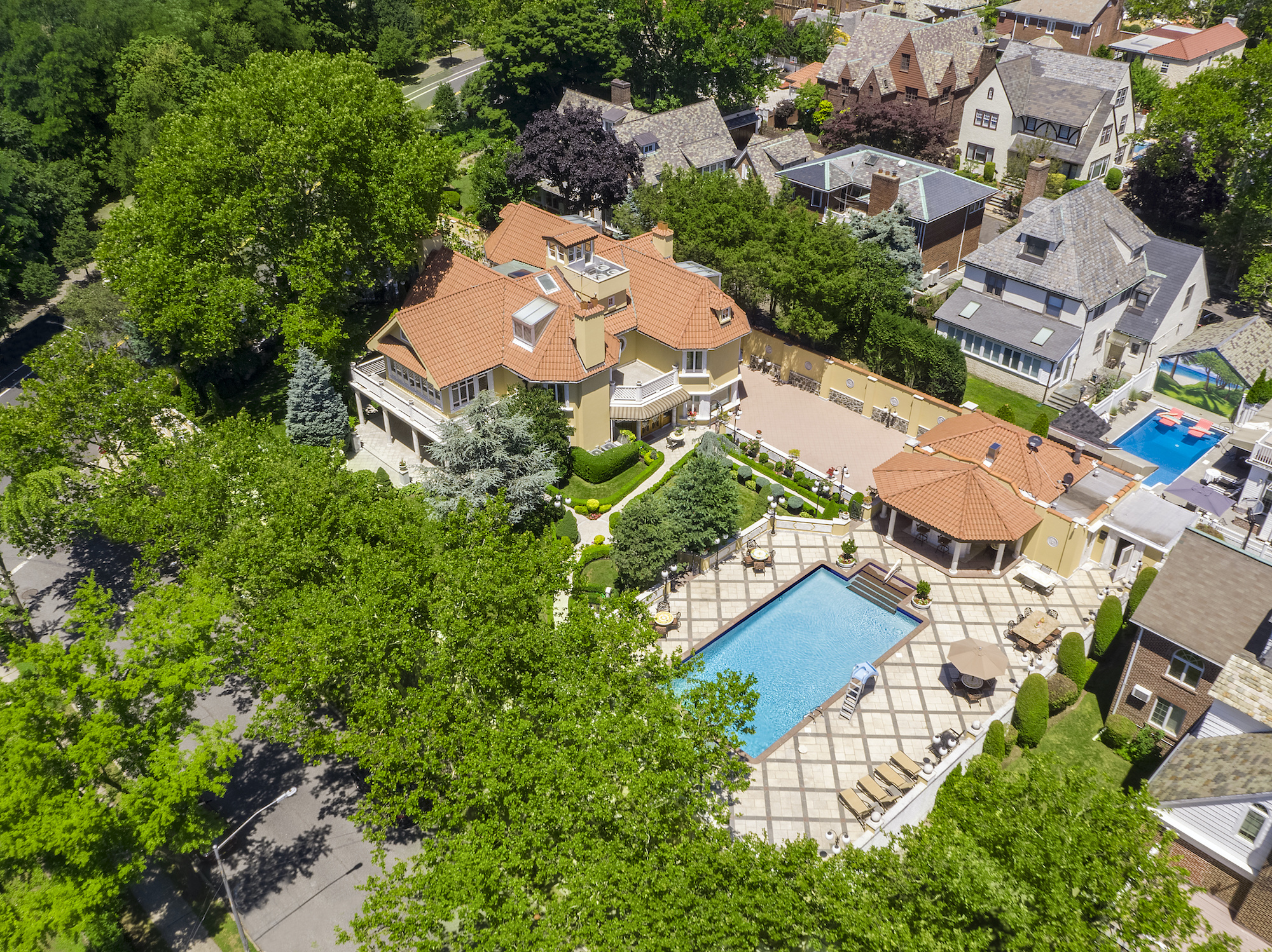 $11.2M Bay Ridge mansion has Italian vibes, a waterslide, and an outdoor kitchen