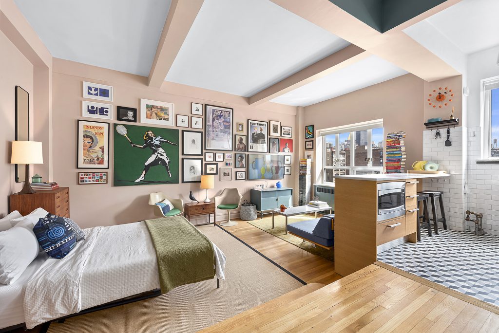 This retro Chelsea studio with an office nook is asking $550K