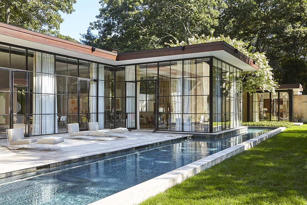 Architect Michael Haverland lists his modern glass house in East Hampton for $5M