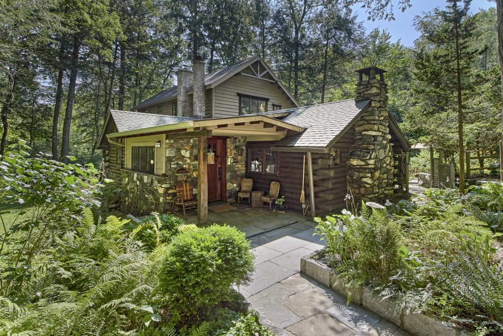 This century-old Adirondack-style log cabin can be your upstate retreat for $920K
