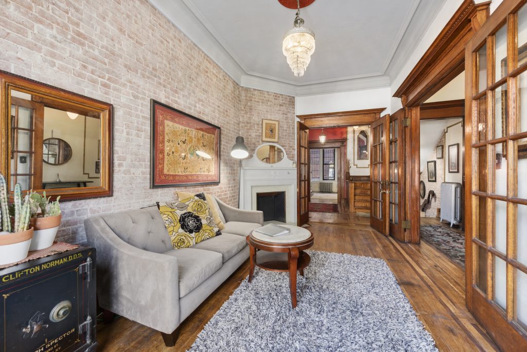 For $2.5M, this five-story Georgian townhouse on Strivers’ Row is a well-preserved Harlem gem