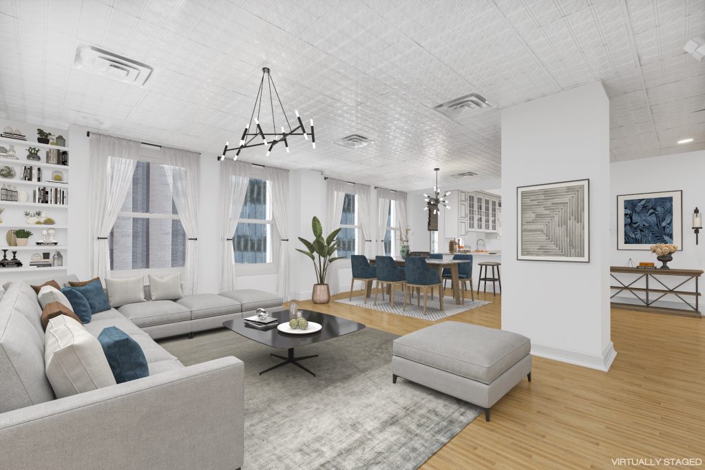 For $2.5M, this huge FiDi co-op has ornate brass gates and lots of room for transformation