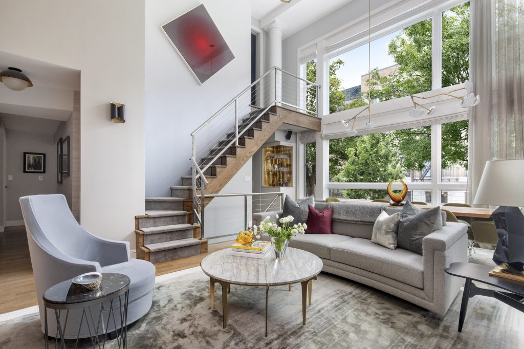 $6M Park Slope triplex condo feels like a modern townhouse, private garden and parking included